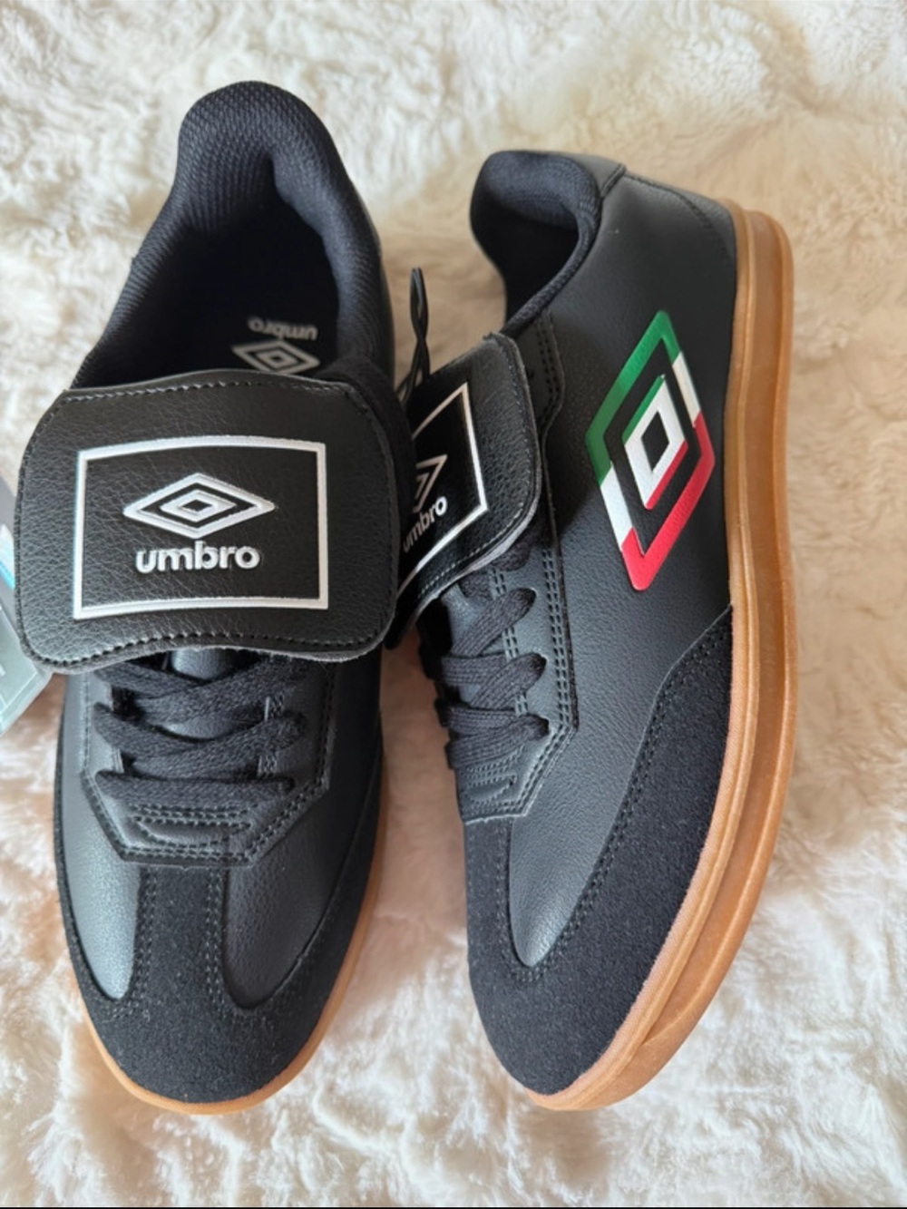 NWT  Size 7 Juunior
Umbro Black Sneakers with Green & Red Logo and Gum Sole